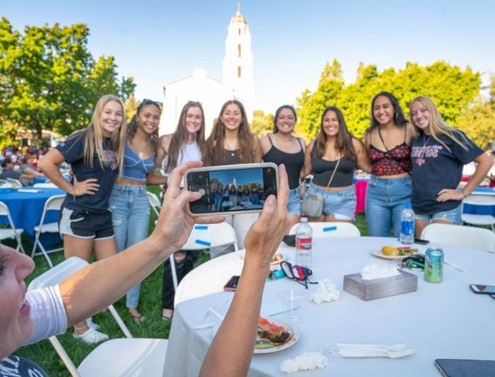 Students taking a photo together at orientation